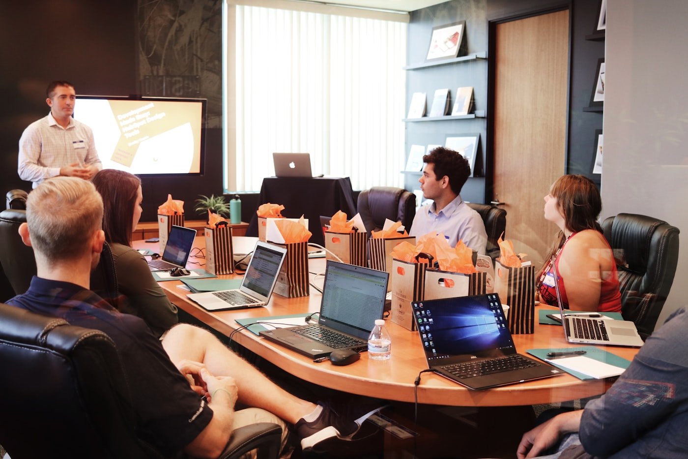 Business professionals collaborating with technology in a modern office